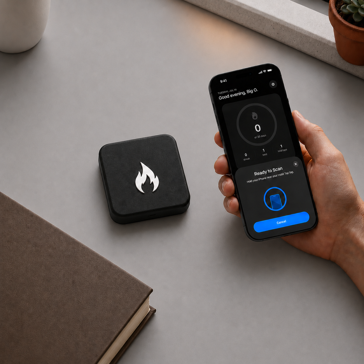 Phone ready to scan beside Habit Tap